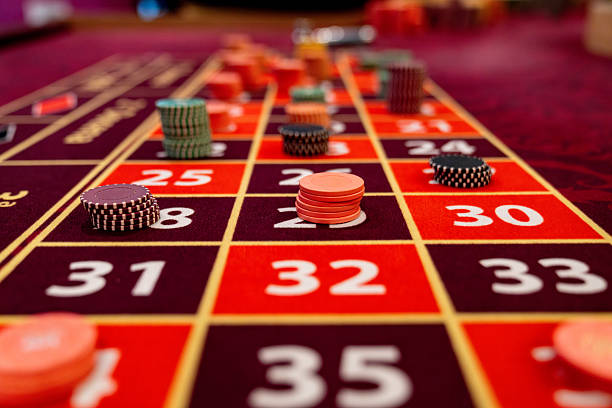 Live dealer studio with multiple camera angles showing Sic Bo table setup
